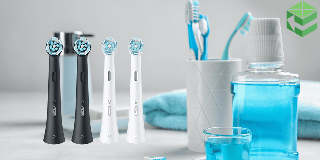 Oral-B iO Toothbrushes in black and white, in a modern bathroom.